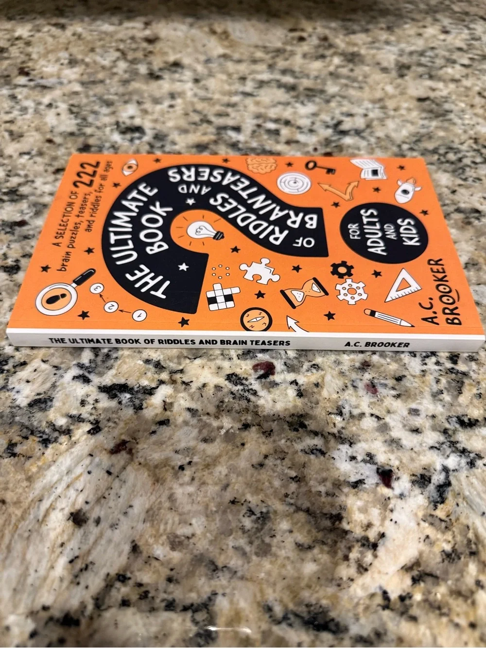 The Ultimate Book of Riddles and Brain Teasers - Orange Cover